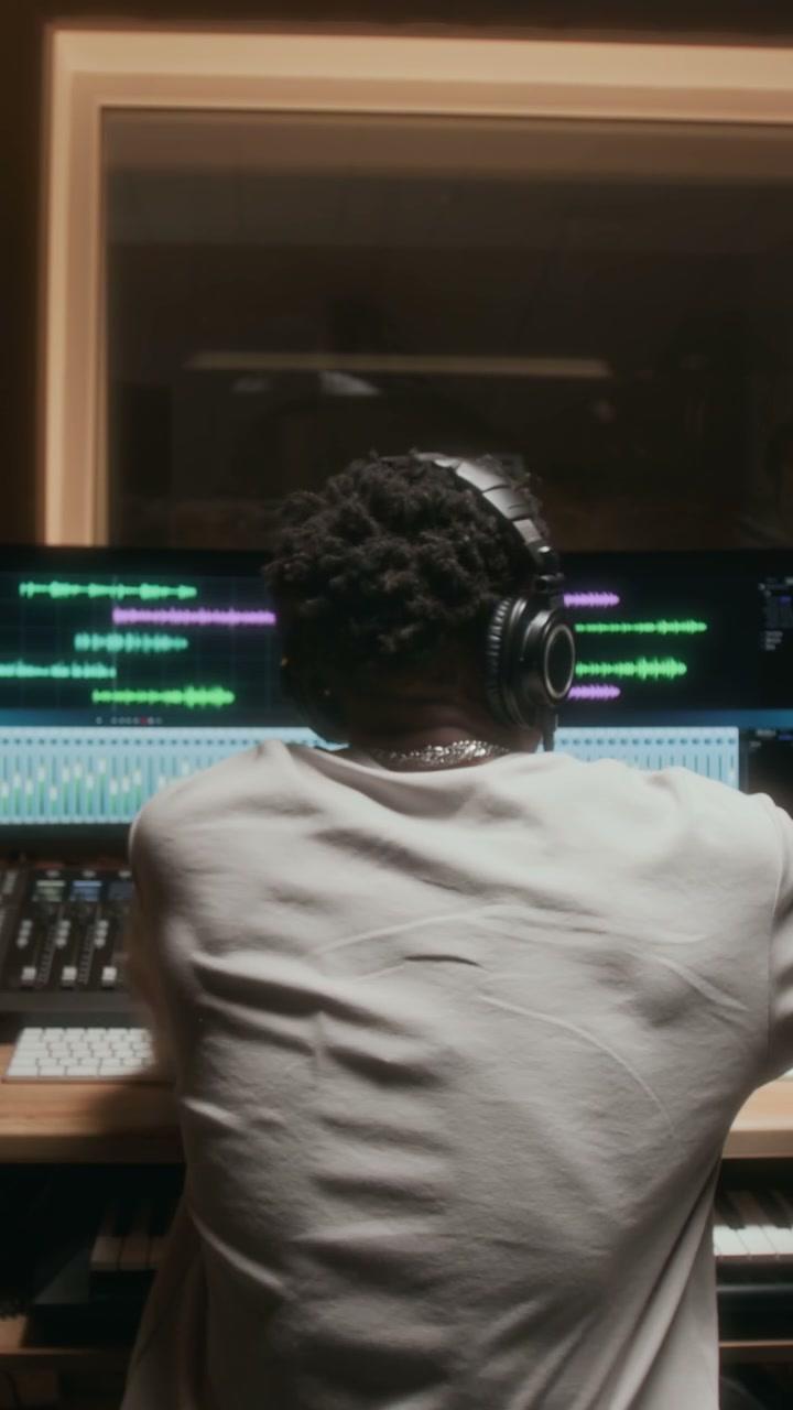 Music Producer Working in Recording Studio