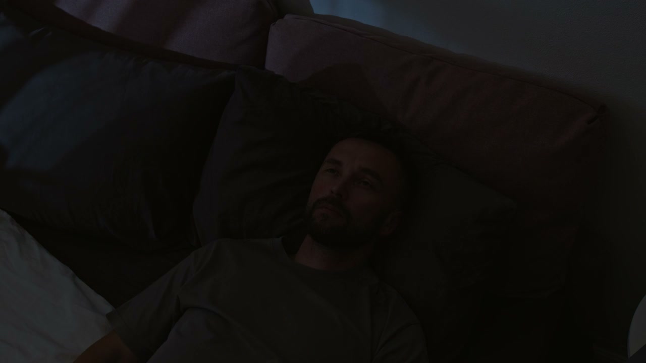 Man Lying Awake in Bed Time-Lapse