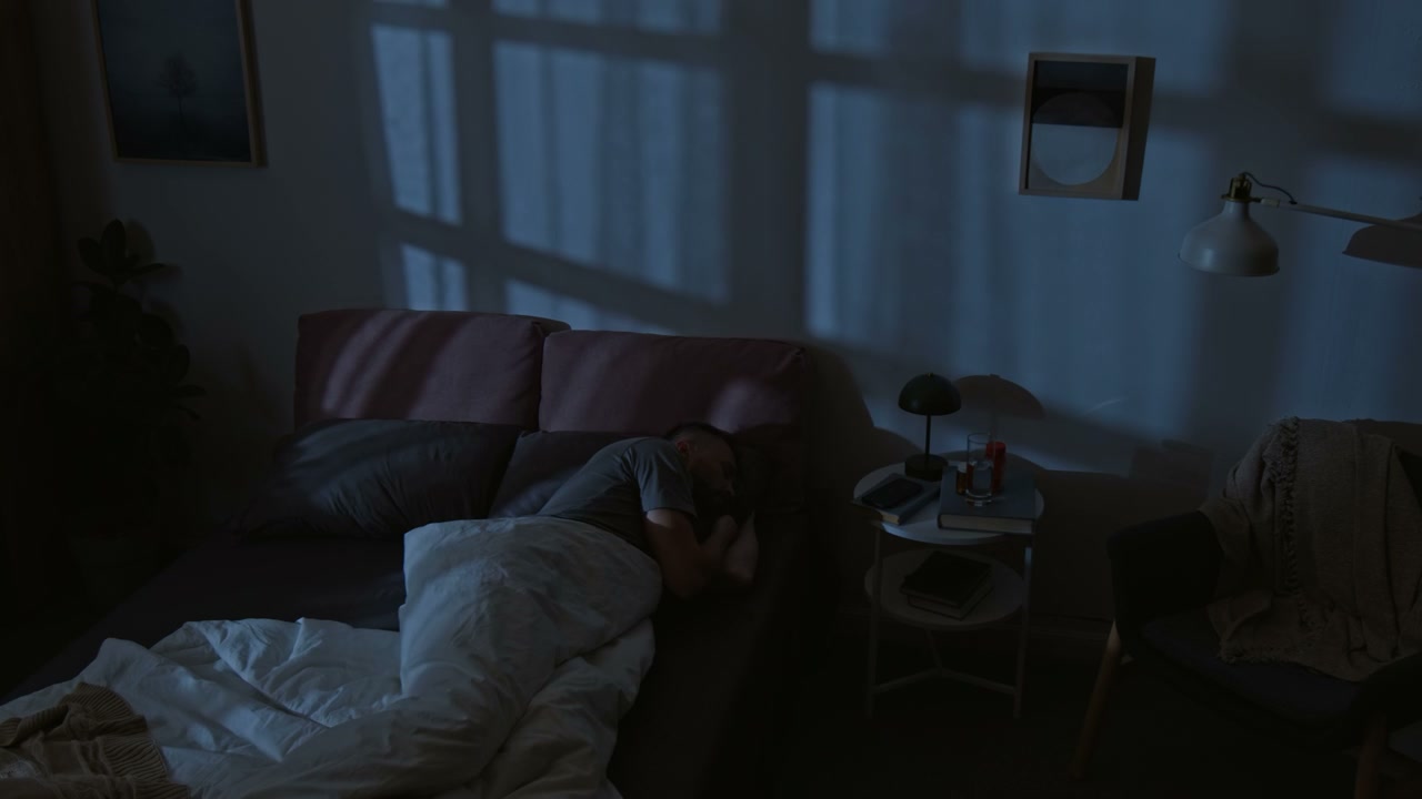 Man with Insomnia Using Phone in Bed Time-Lapse
