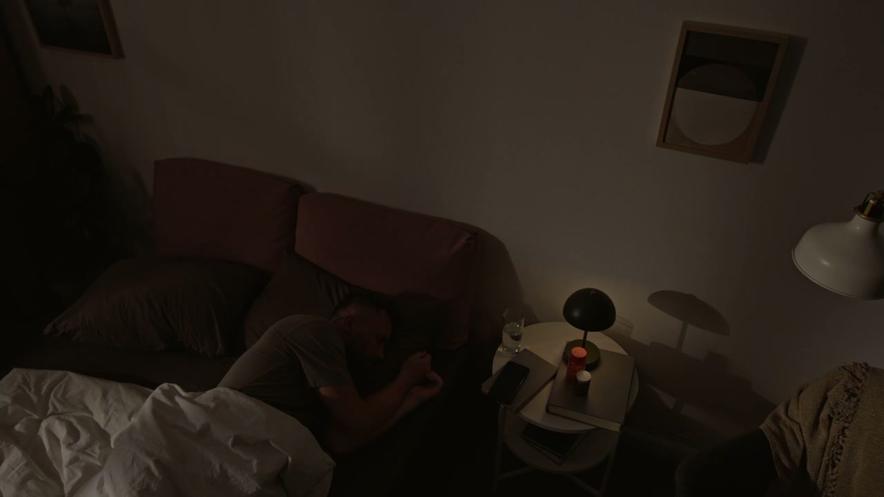 Man Having Restless Sleep in Bedroom Time-Lapse