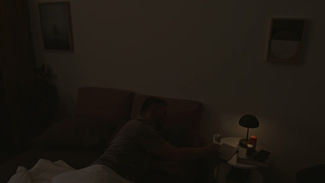Man Struggling to Sleep in Bedroom Time Lapse