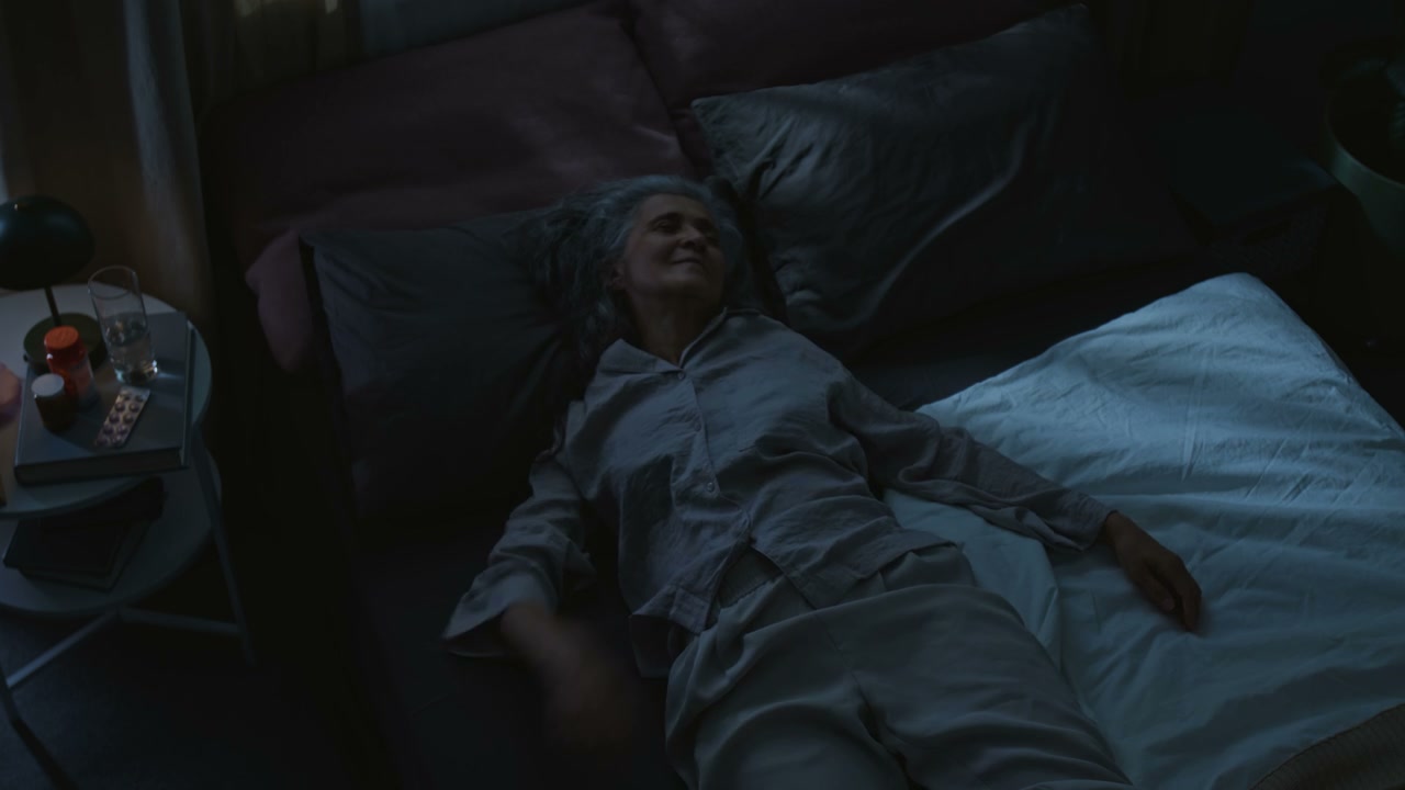 Time-Lapse of Elderly Woman with Restless Sleep