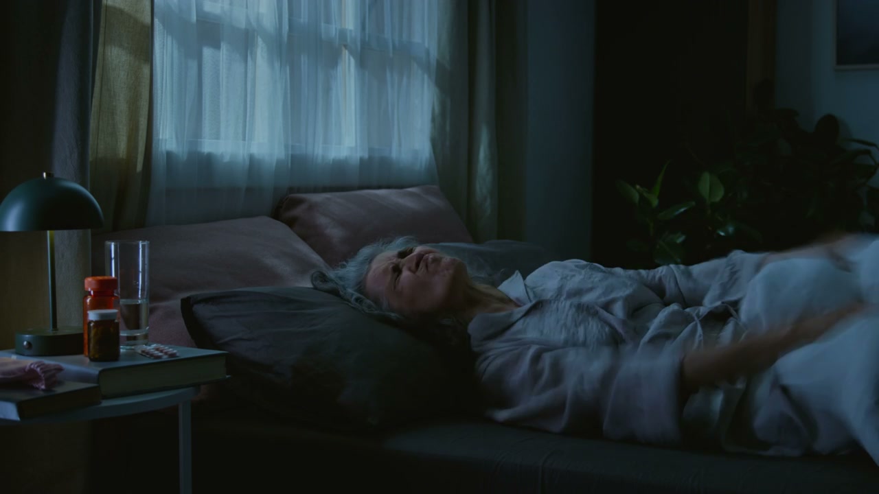 Senior Woman with Insomnia at Night