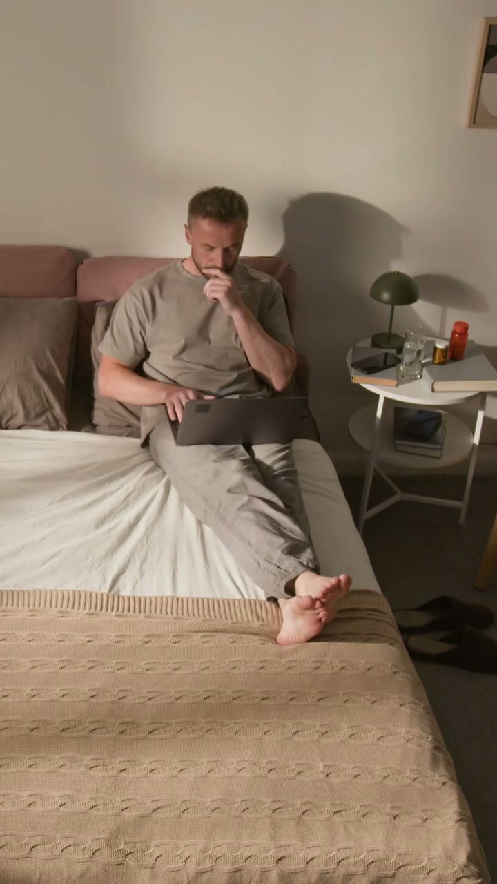 Man Working and Sleeping in Bed Time-Lapse