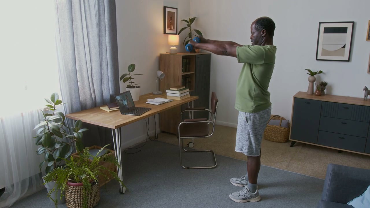 Senior Man Doing Home Dumbbell Workout