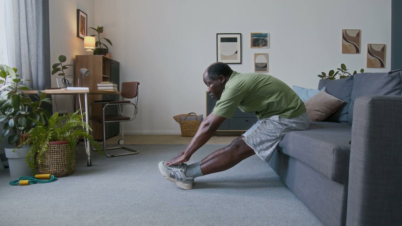 Senior Man Stretching and Doing Tricep Dips