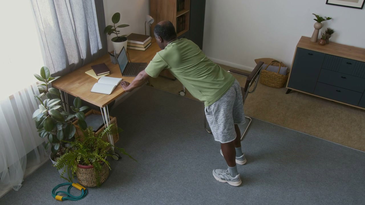 Senior Man Doing Desk Exercises