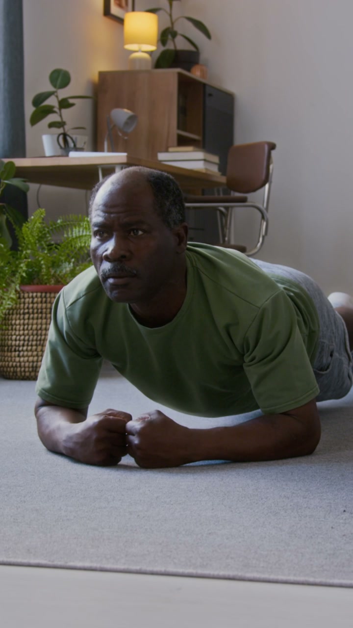Senior Man Plank Exercise at Home