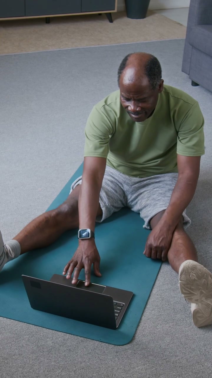 Senior Man Doing Online Fitness at Home