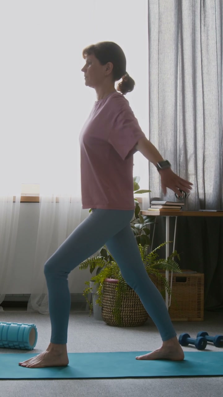 Senior Woman Practicing Tai Chi at Home