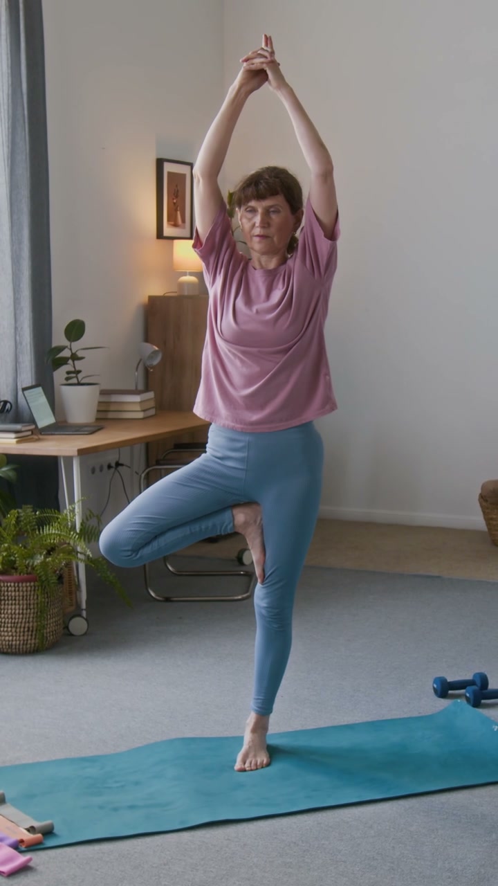 Senior Woman Doing Tree Pose Yoga