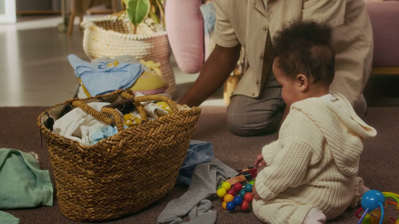 Father and Baby Playing During Laundry