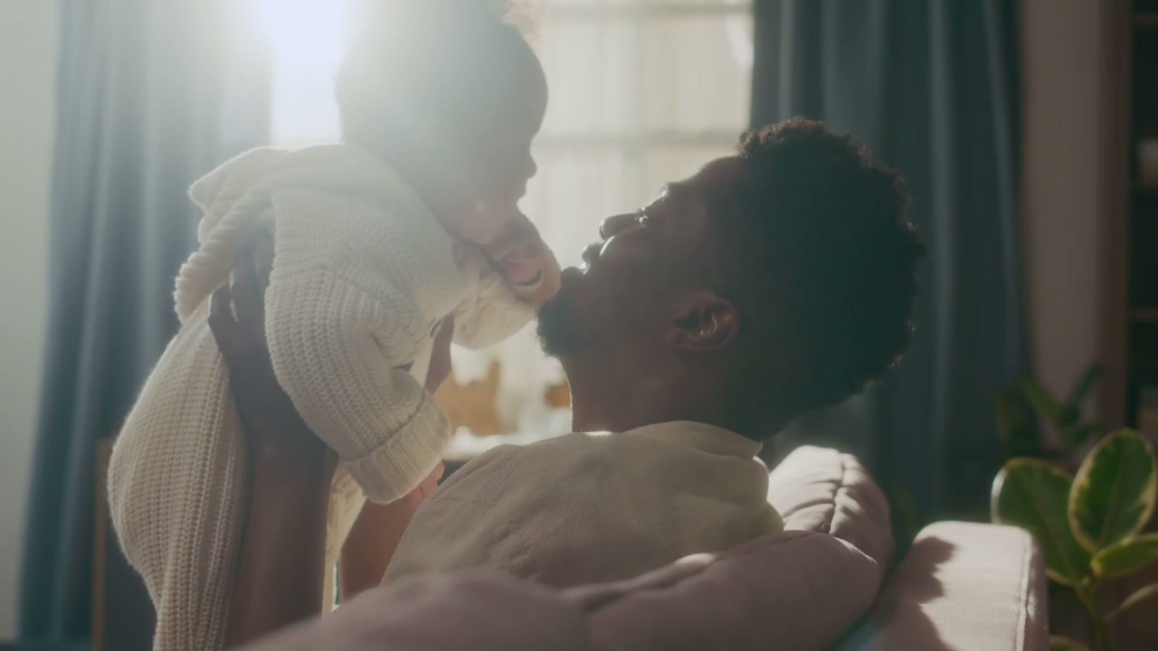 Happy Father Bonding with Baby