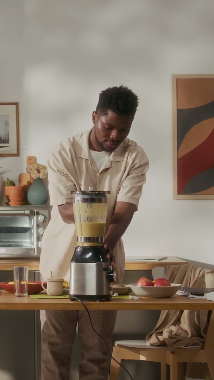 Young Man Blending Healthy Smoothie