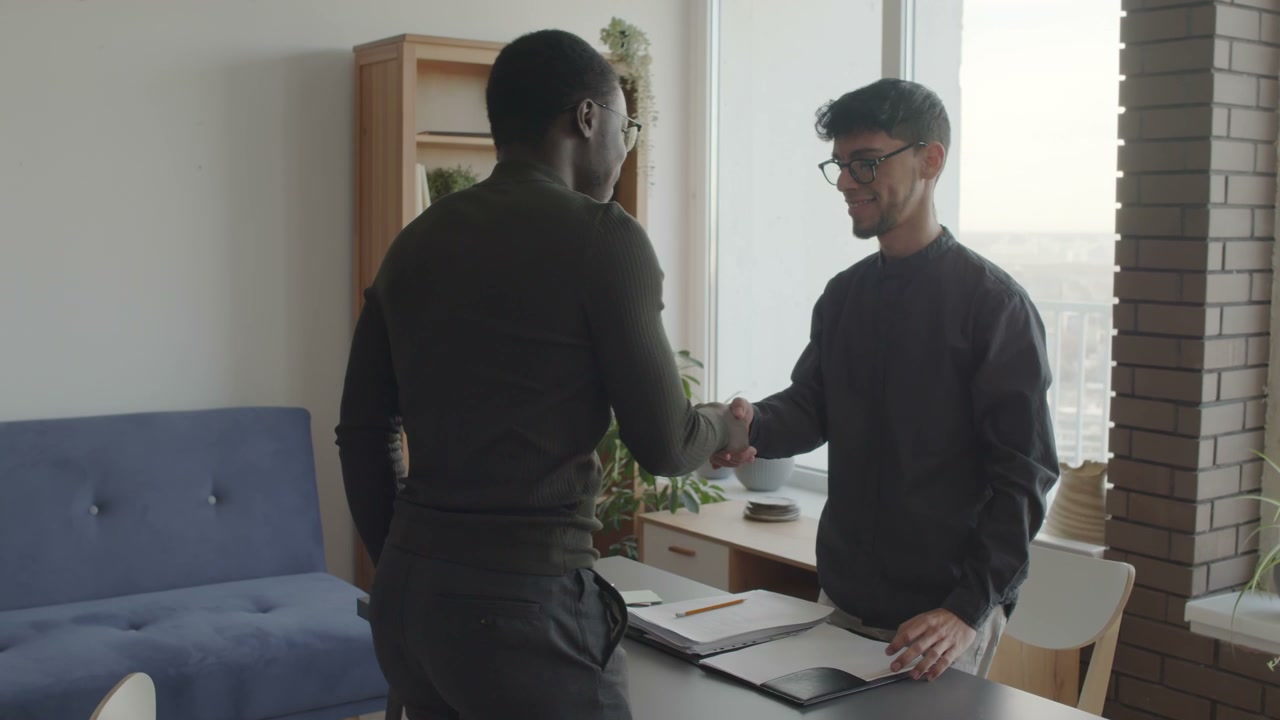 Business Meeting and Handshake