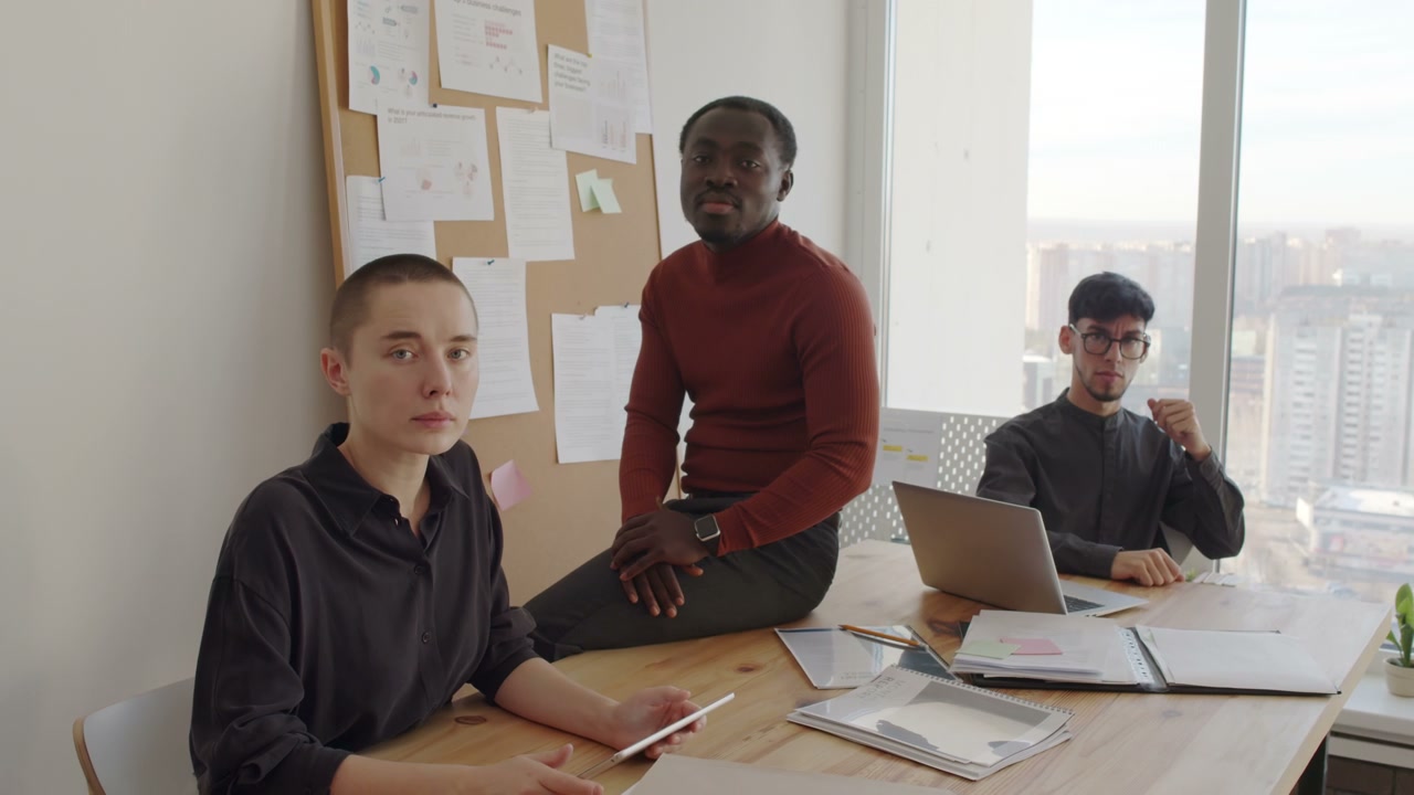 Diverse Business Team Posing in Modern Office