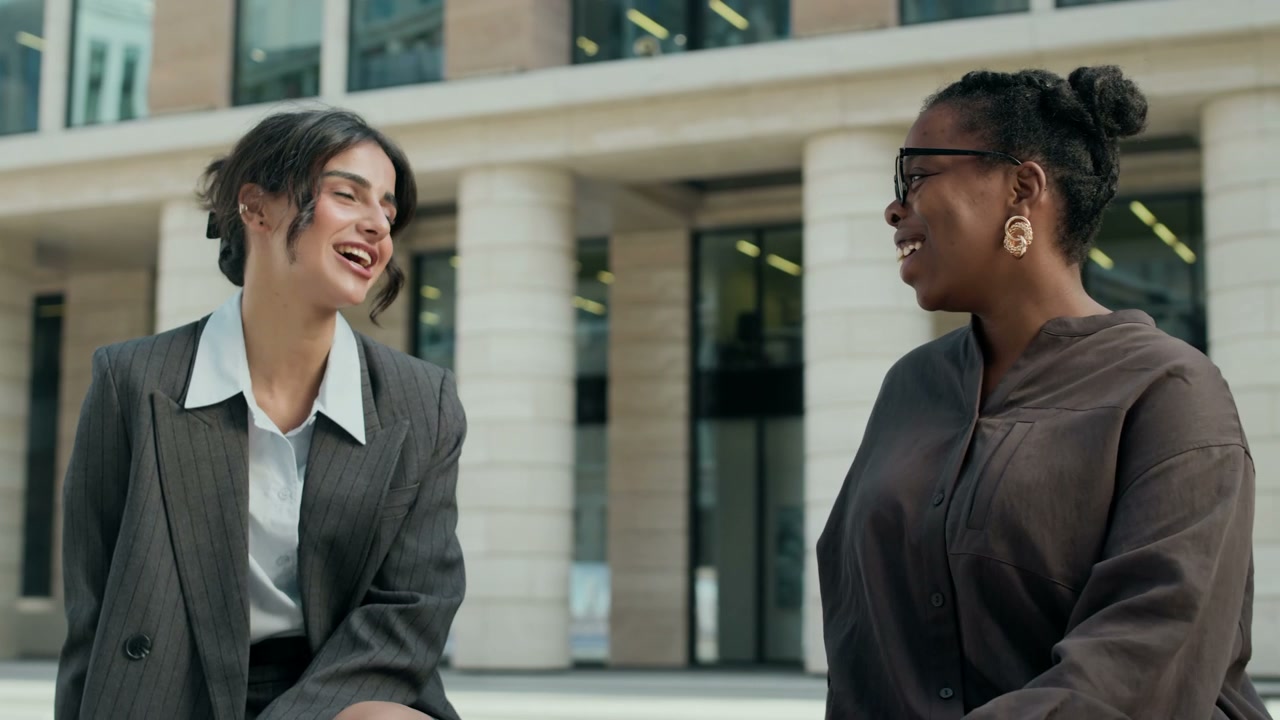Businesswomen Having Outdoor Conversation