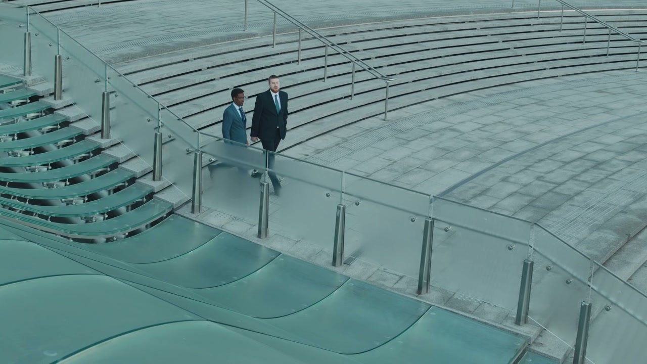 Businessmen Descending Modern Outdoor Stairs