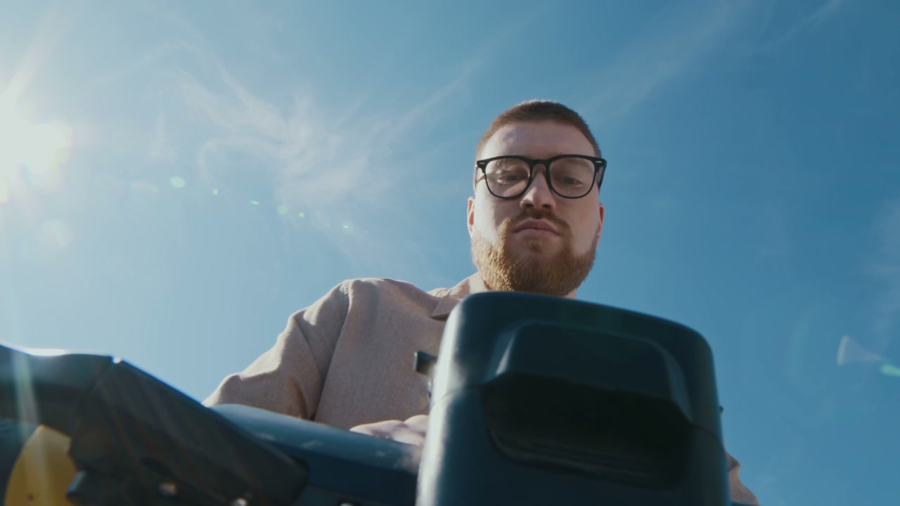 Bearded Man Riding Electric Scooter