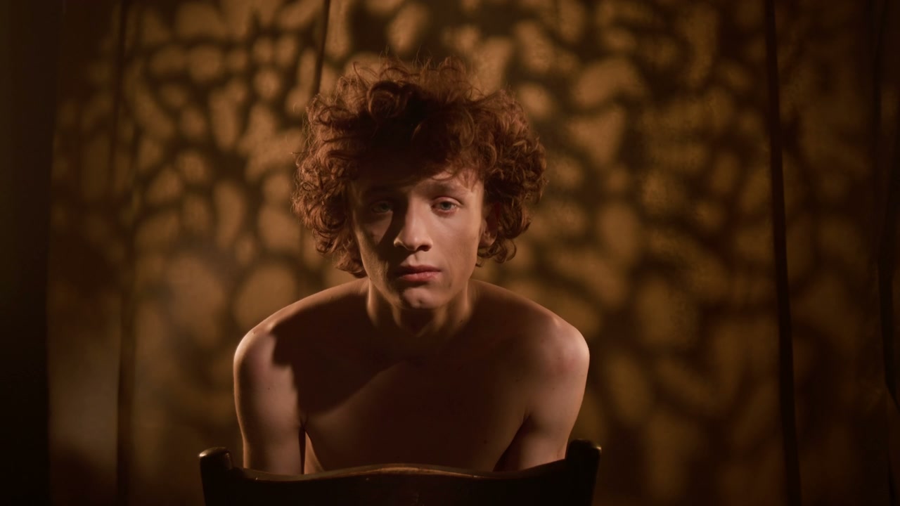 Pensive Young Man Portrait in Studio