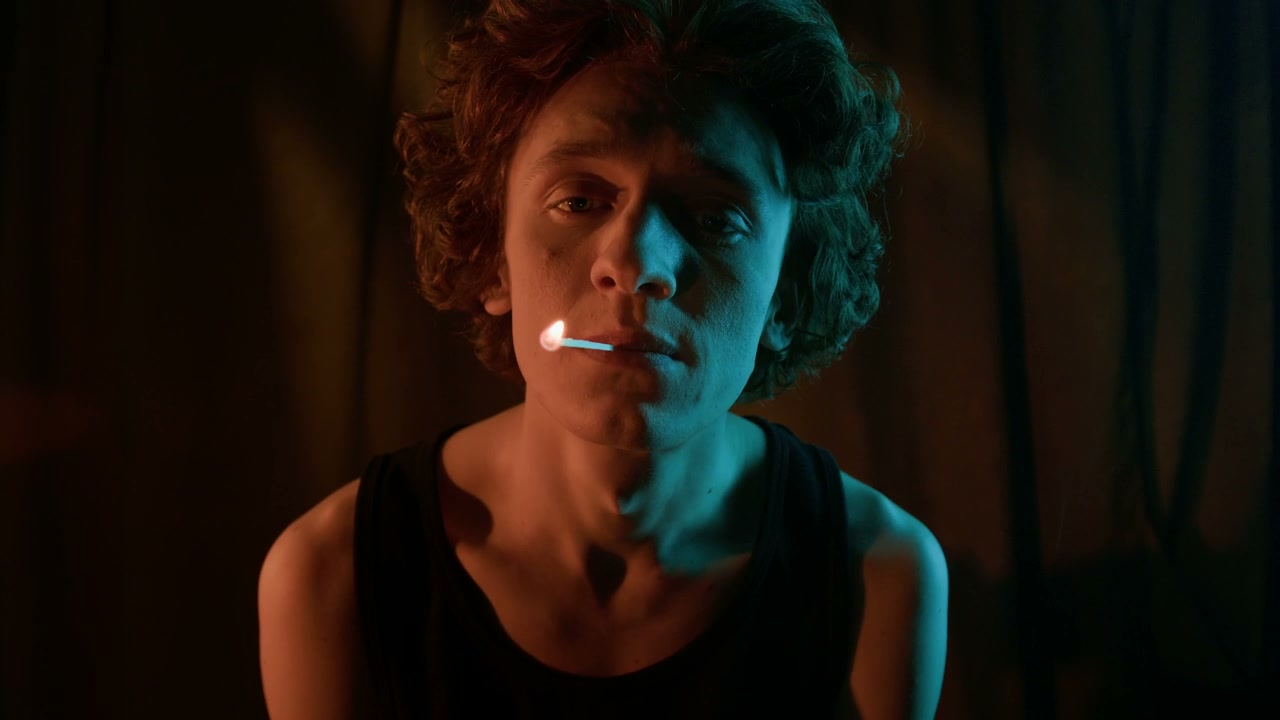 Pensive Person with Burning Match