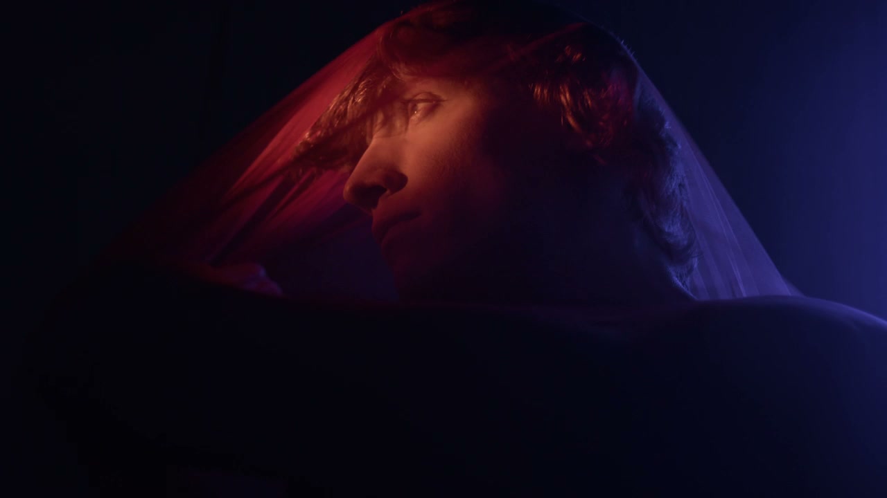 Mysterious Youth Behind Translucent Fabric