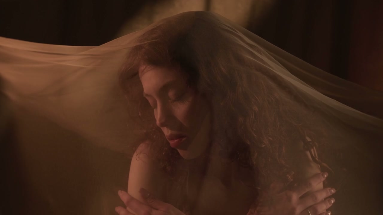 Woman Under Flowing Veil in Studio
