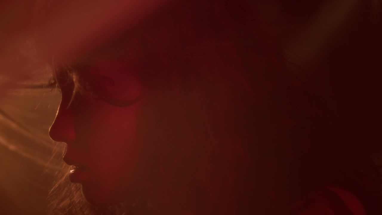 Close-Up Profile of Pensive Young Woman
