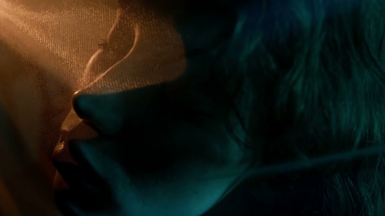 Pensive Woman in Profile Behind Sheer Fabric