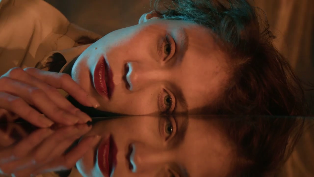 Young Woman's Pensive Portrait with Reflection