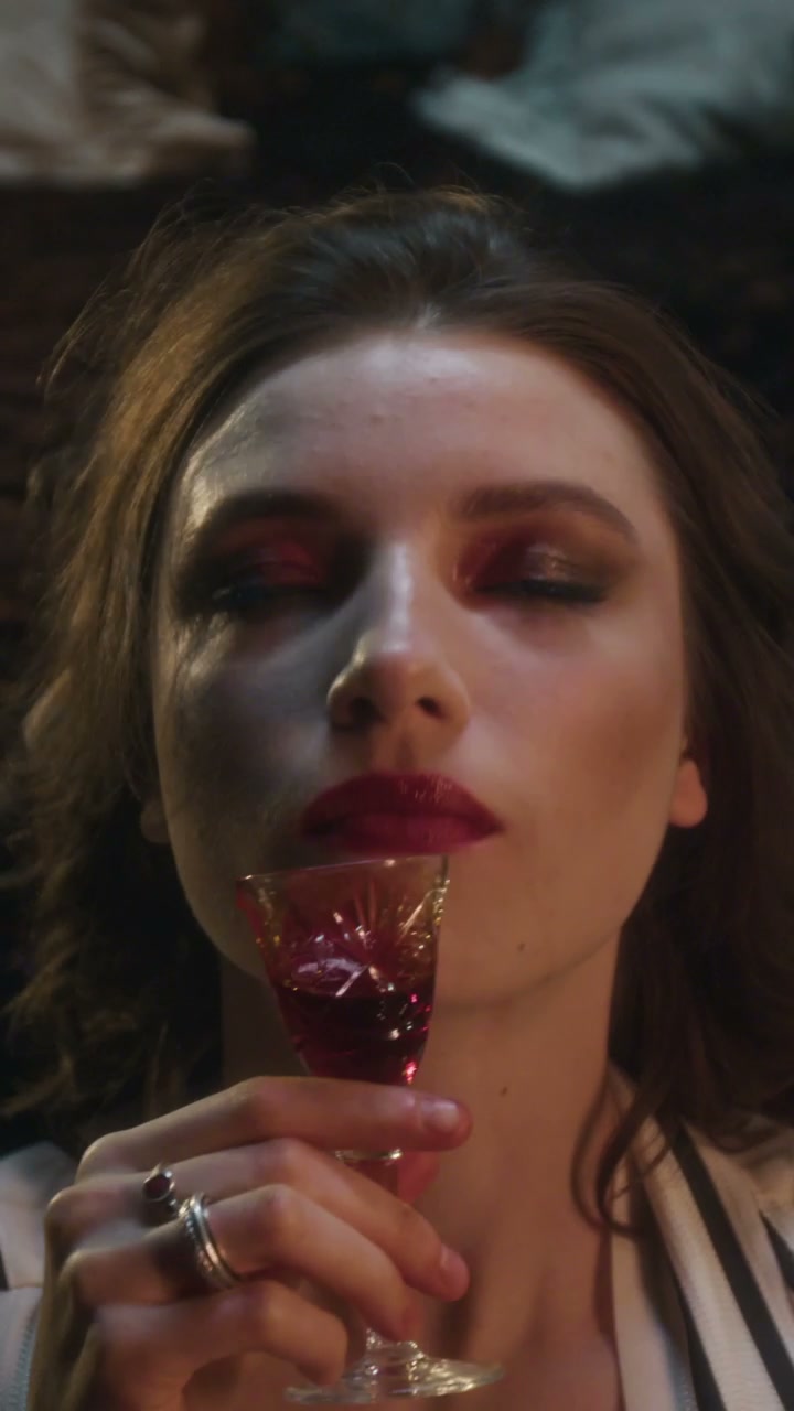 Woman Drinks and Transforms into Vampire