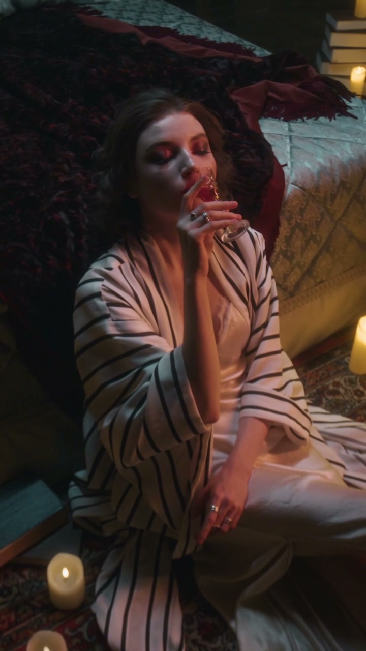 Vampire Woman Revealing Fangs