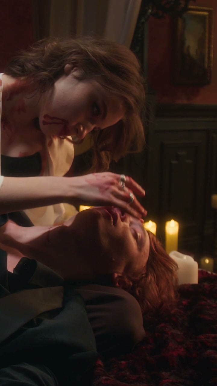 Gothic Vampire Woman with Bloodied Man