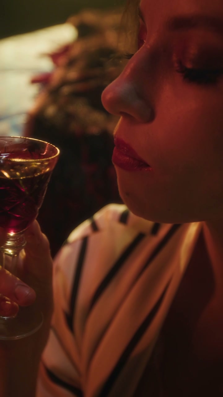Vampire Woman Reveals Fangs After Drinking
