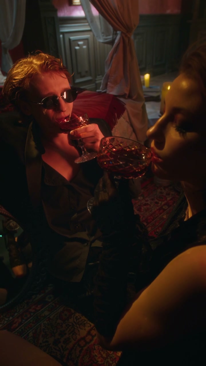 Gothic Vampires Toasting Drinks