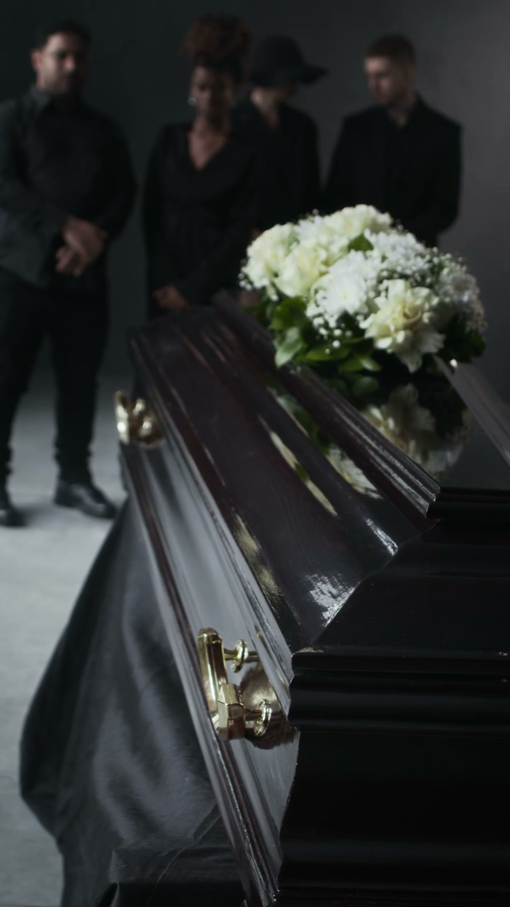 Funeral Service with Coffin and Mourners