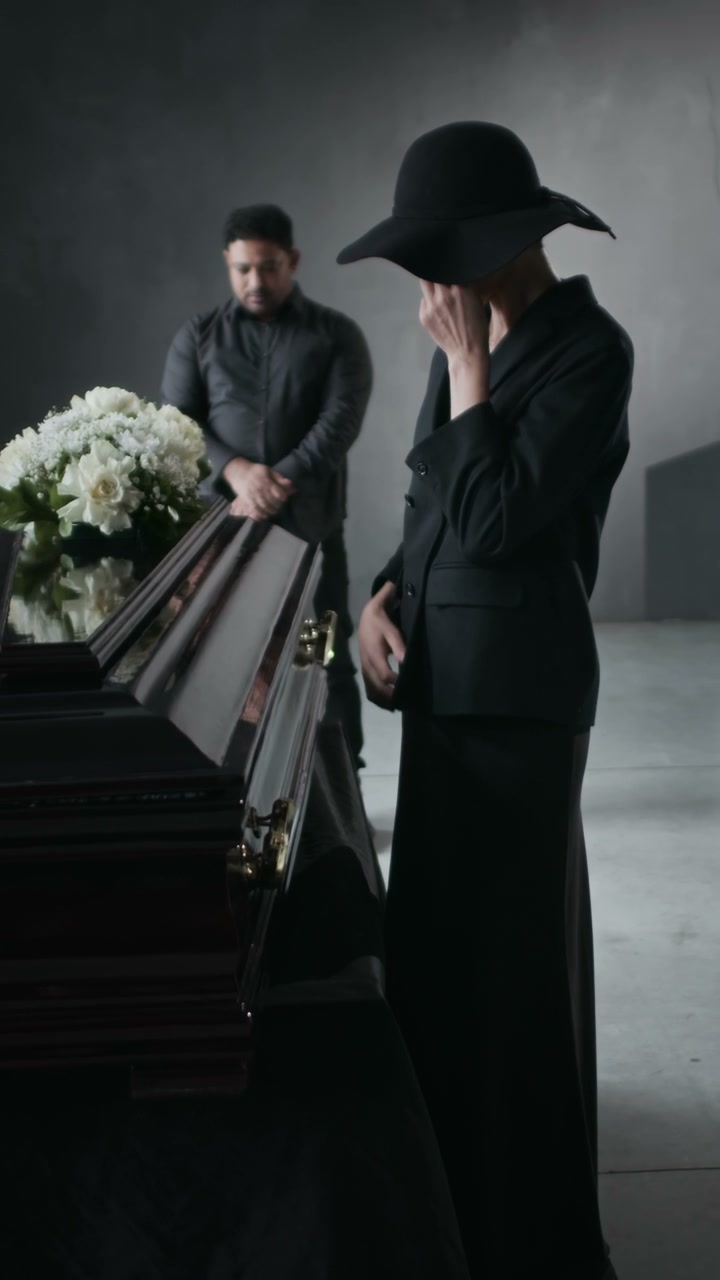 Woman Mourning at Funeral Service