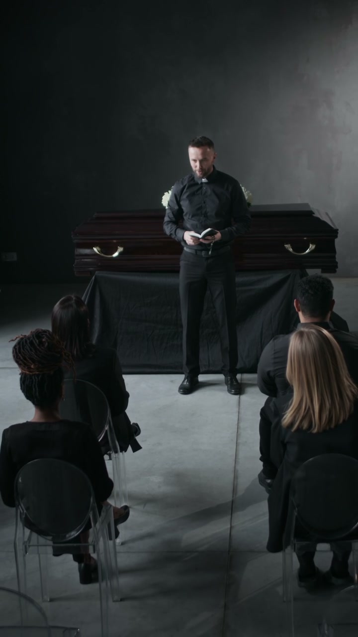 Officiant Leading Funeral Service