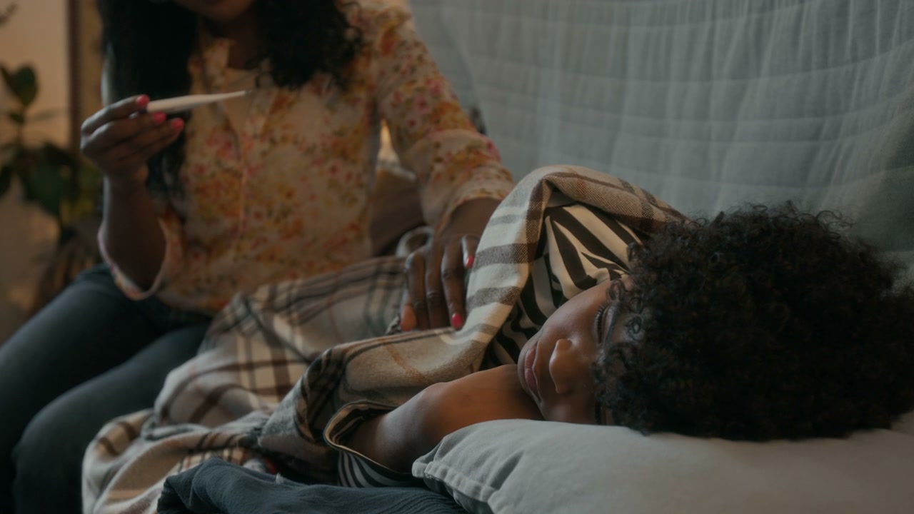 Mother Cares for Sick Son