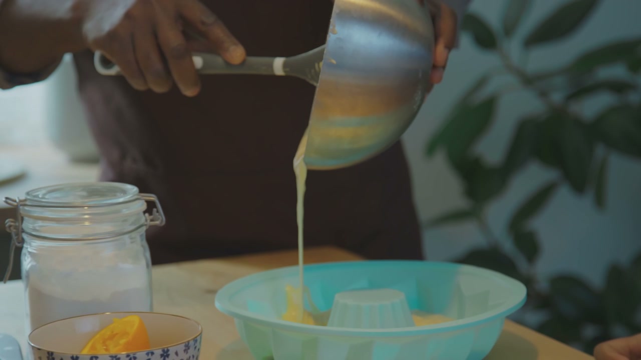 Pouring Cake Batter into Baking Mold