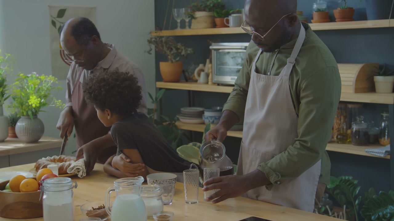 Multi-Generational Family Preparing Food in Kitchen