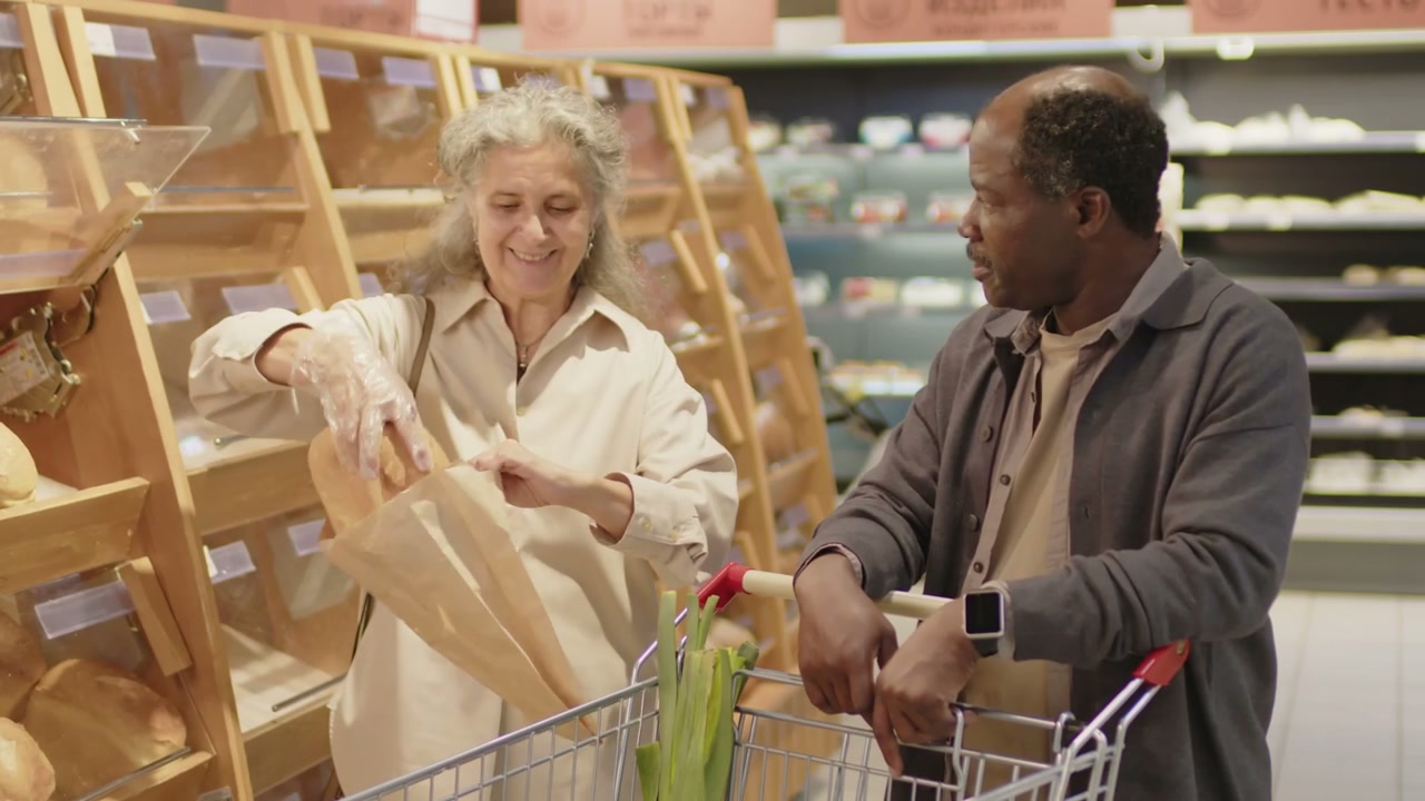 Senior Couple Shopping for Bread