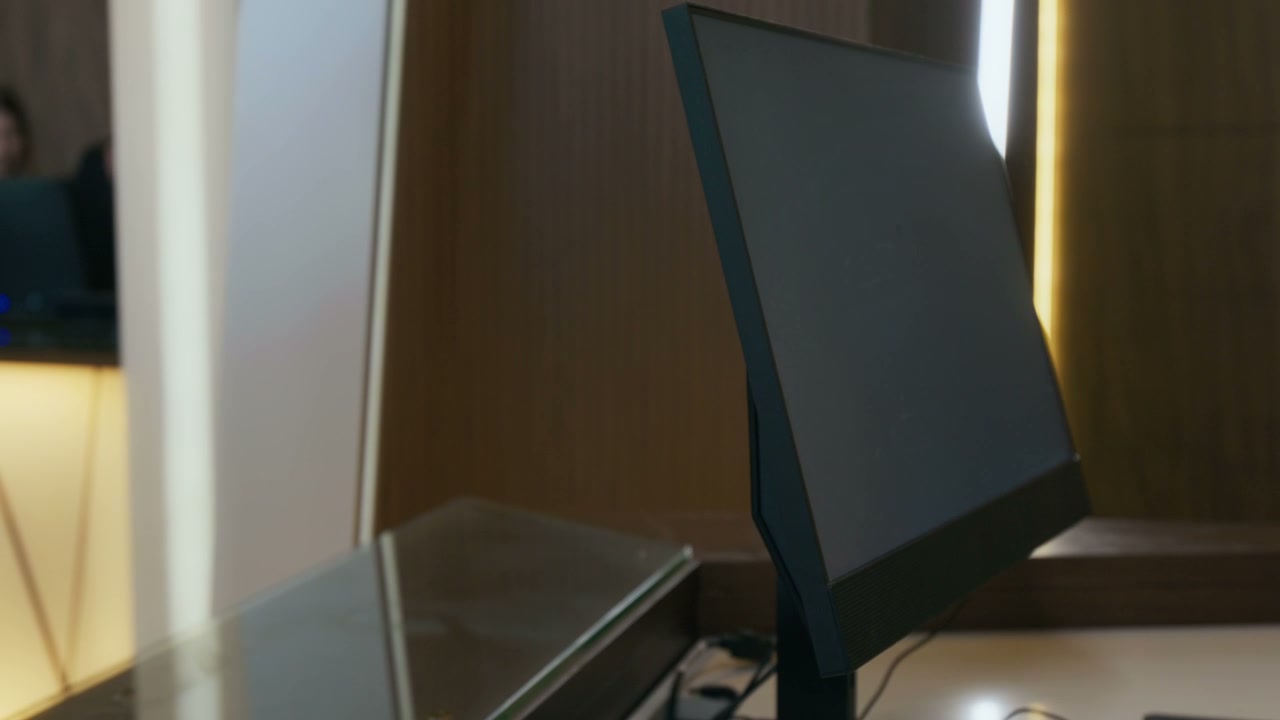 Hotel Guest Receiving Key Card at Reception