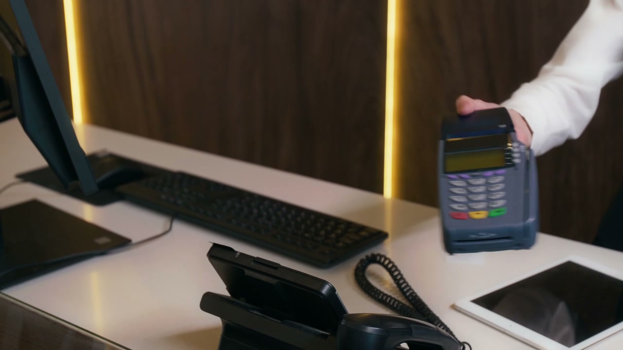 Contactless Credit Card Payment at Hotel Desk