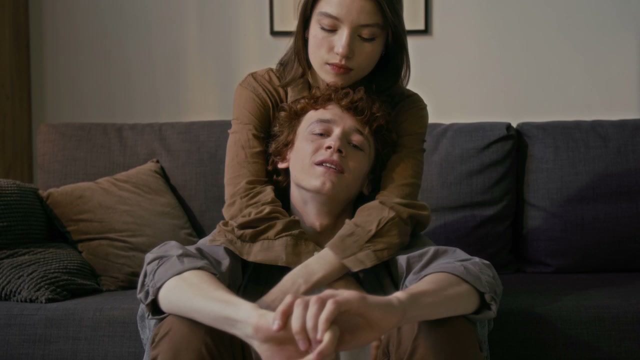 Romantic Couple Cuddling at Home