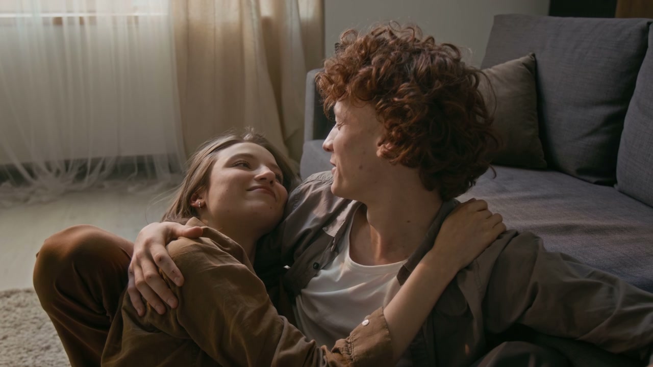 Affectionate Couple Cuddling at Home