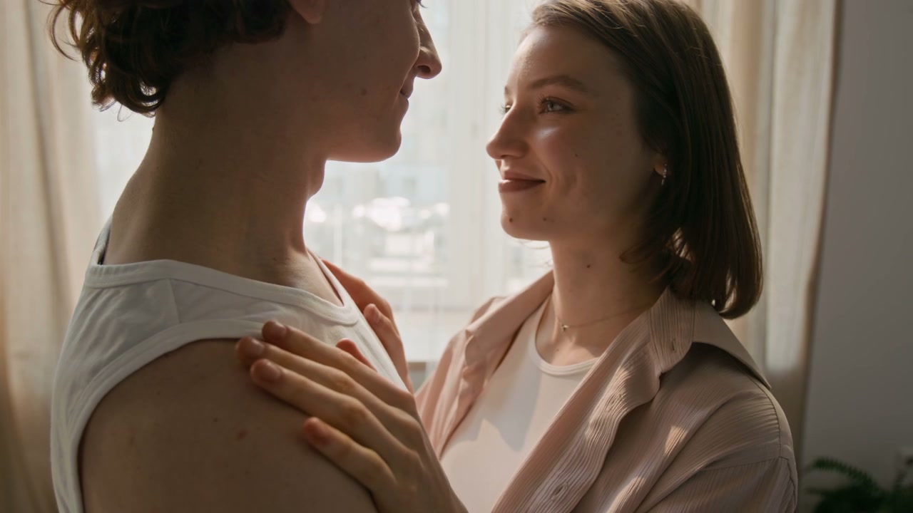 Romantic Couple Embracing at Home