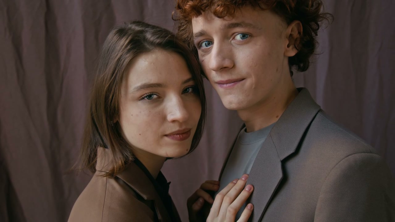 Young Couple Posing in Studio
