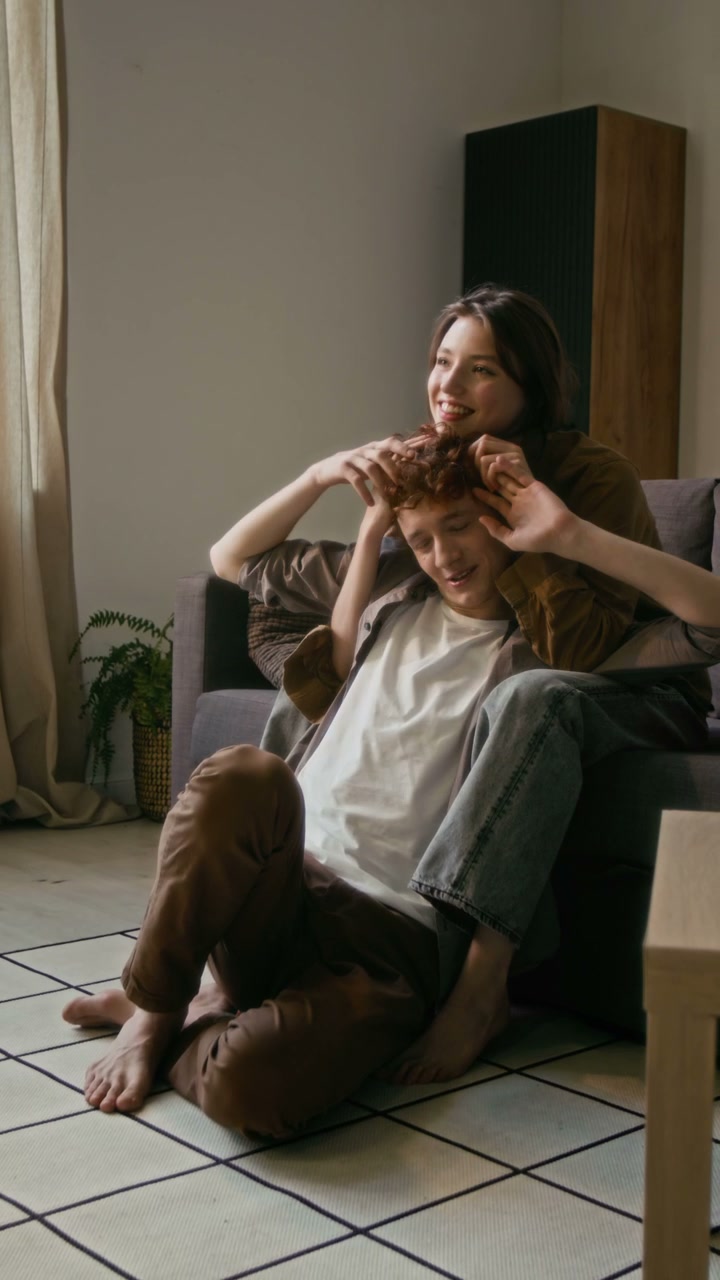 Playful Romantic Couple at Home