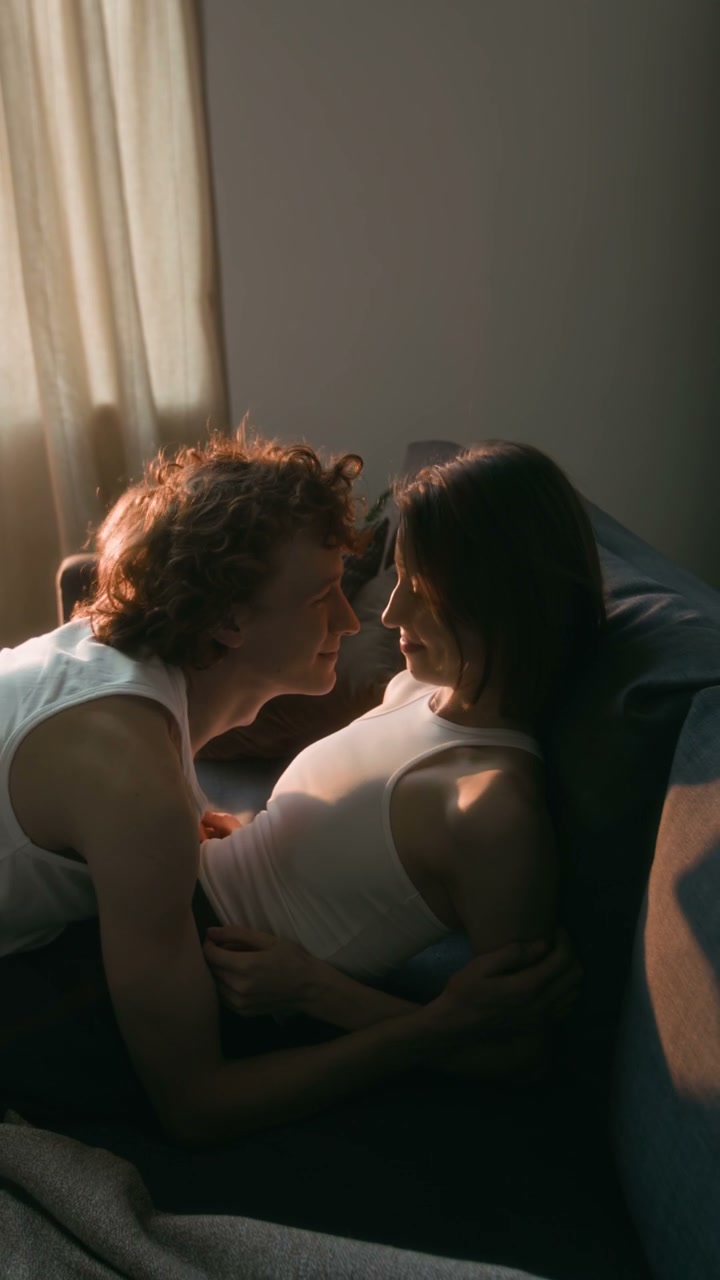 Romantic Couple Cuddling at Home